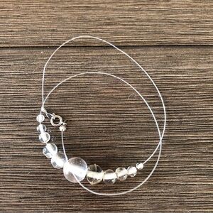 Handmade floating clear round glass beaded necklace